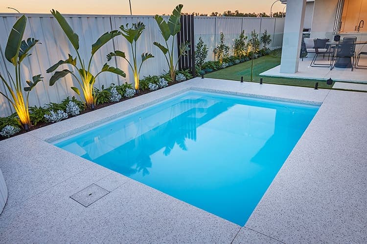 outdoor entertaining area with a swim spa and correct pool size
